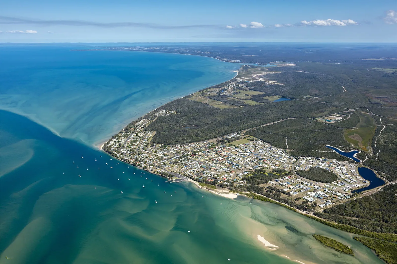 Aerial view of Burrum Heads, the river mouth, sandbanks and surrounding coastline